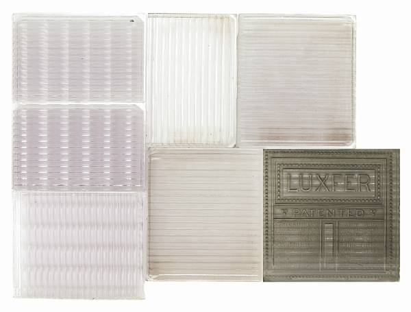 Appraisal: A group of eighty-four trimmed Frank Lloyd Wright glass tiles