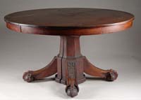 Appraisal: FABULOUS ROUND CARVED MAHOGANY BANQUET TABLE Split pedestal base having