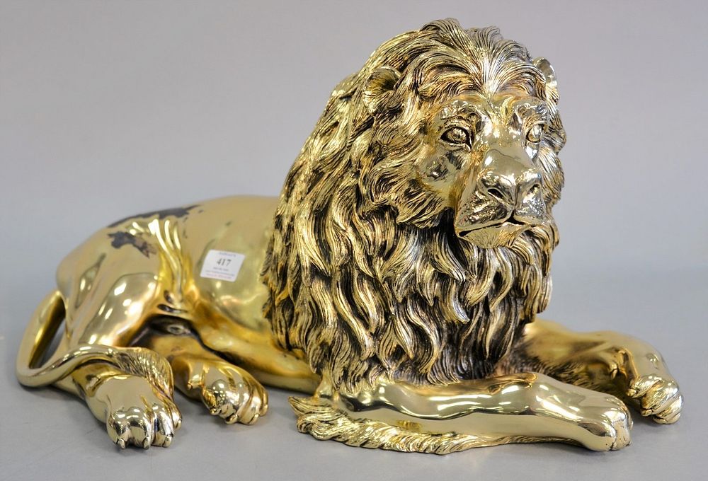 Appraisal: Large Italian sterling and gold-plated recumbent lion sterling silver with