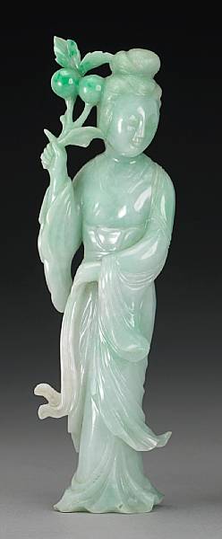 Appraisal: A carved jadeite maiden The standing beauty shown lifting a