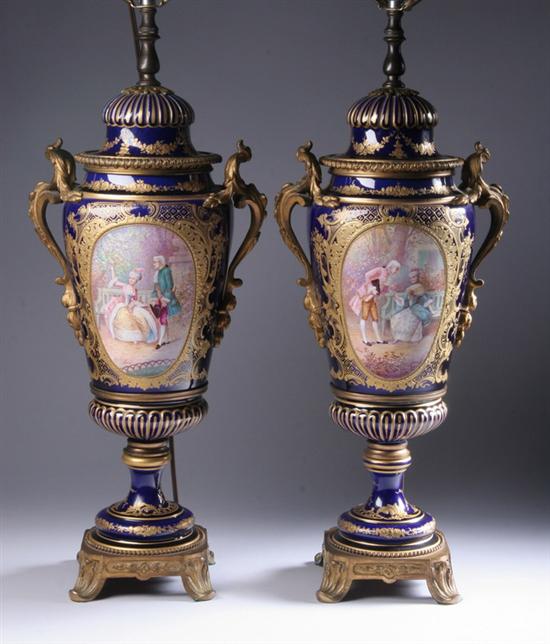 Appraisal: PAIR BRONZE DOR -MOUNTED S VRES-STYLE PORCELAIN URNS late th