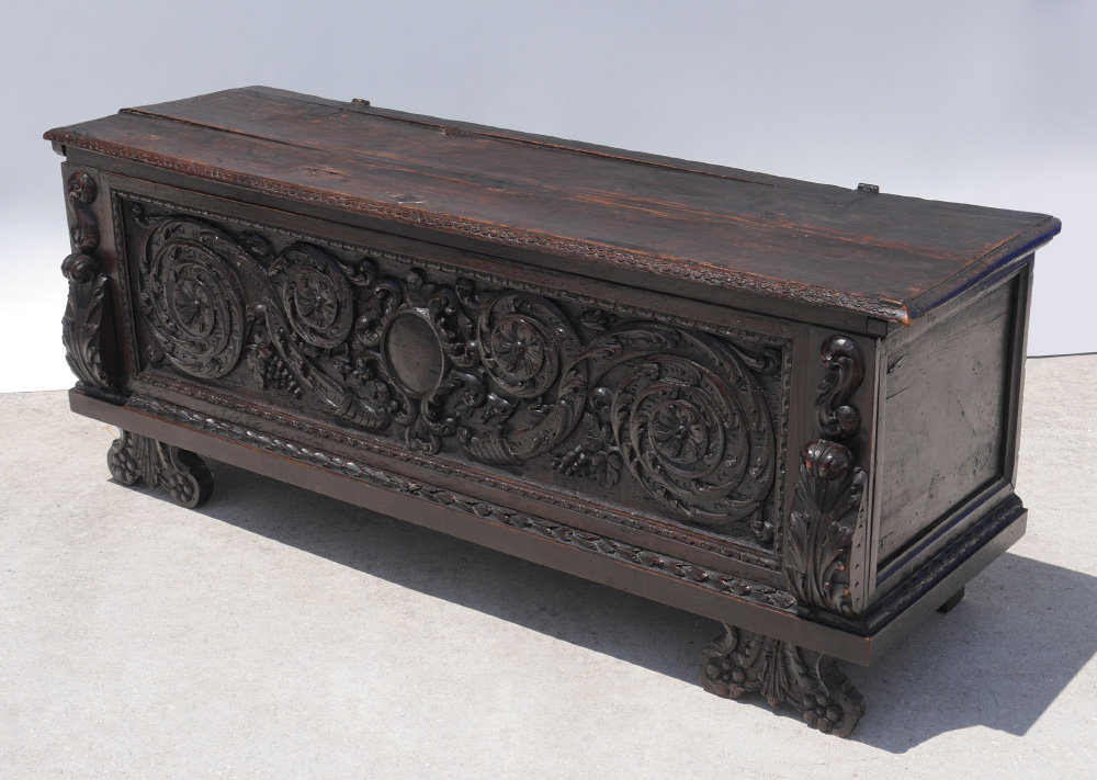 Appraisal: TH CENTURY CARVED ITALIAN WALNUT CASSONE Profusely carved front with