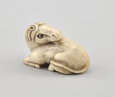 Appraisal: Recumbent Horse Ivory Netsuke Depicting a recumbent horse with painted