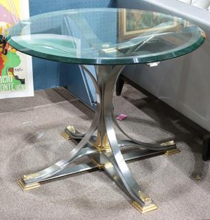 Appraisal: Moderne Neoclassical style occasional table having a bevelled glass top