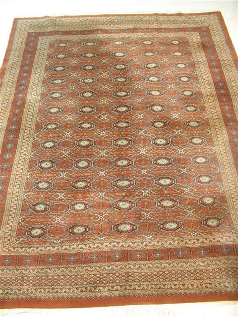 Appraisal: PERISAN STYLE RED GROUND RUG WITH MAT h w in