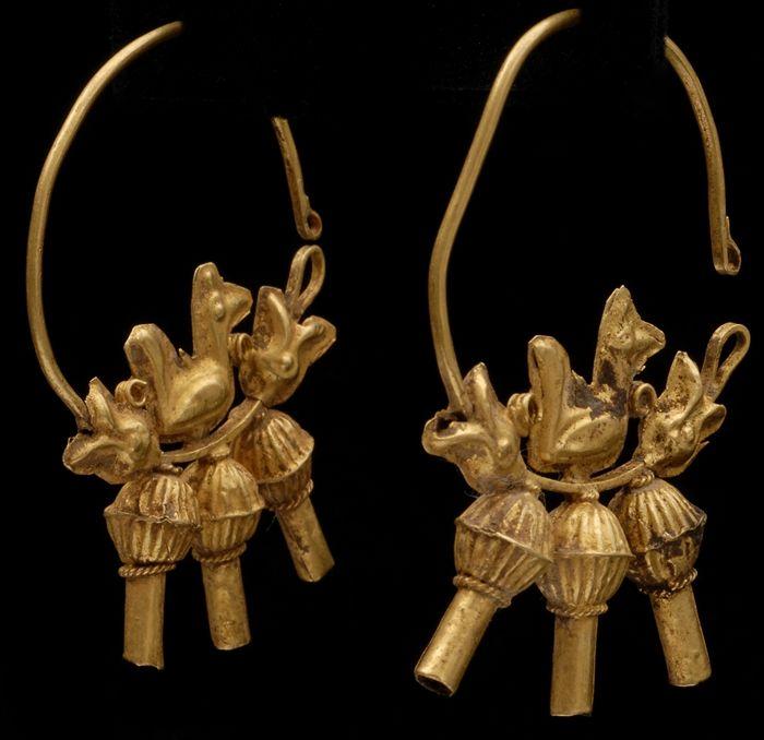 Appraisal: PAIR OF SASSANIAN-STYLE EARRINGS With bird and pomegranate decoration in