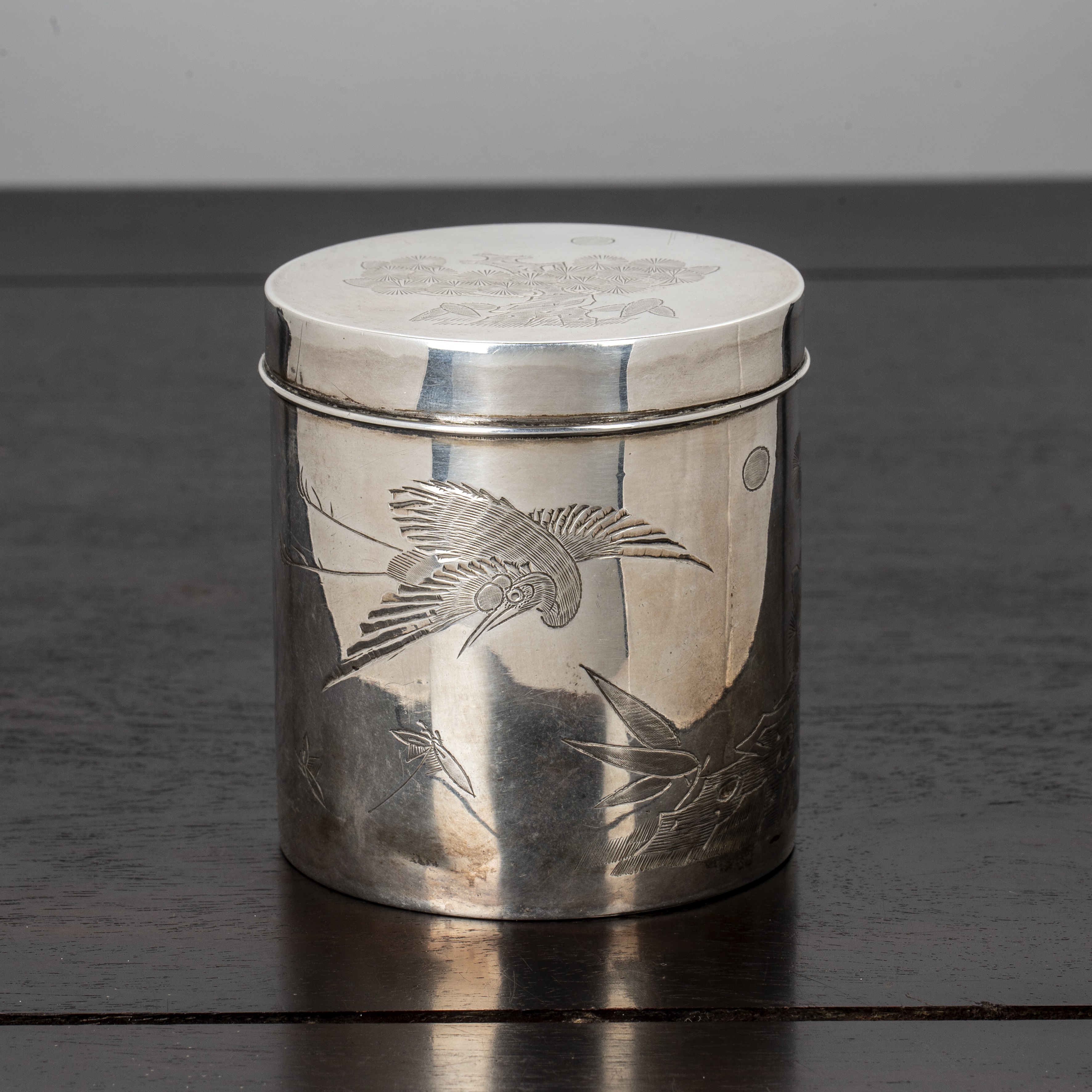 Appraisal: Silver metal cylindrical boxChinese engraved with stork and pine trees