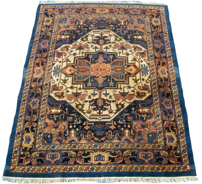 Appraisal: HERIZ CARPET Northwest Persia Navy blue gabled square medallion surrounded