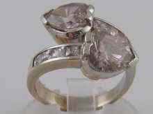 Appraisal: A white metal tests carat gold ring set with pink