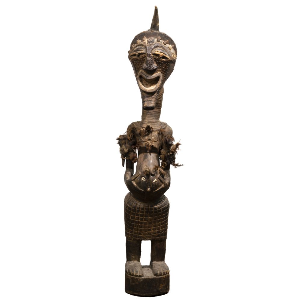 Appraisal: AFRICAN SONGYE FETISH FIGURECarved wood having animal hide clay feather