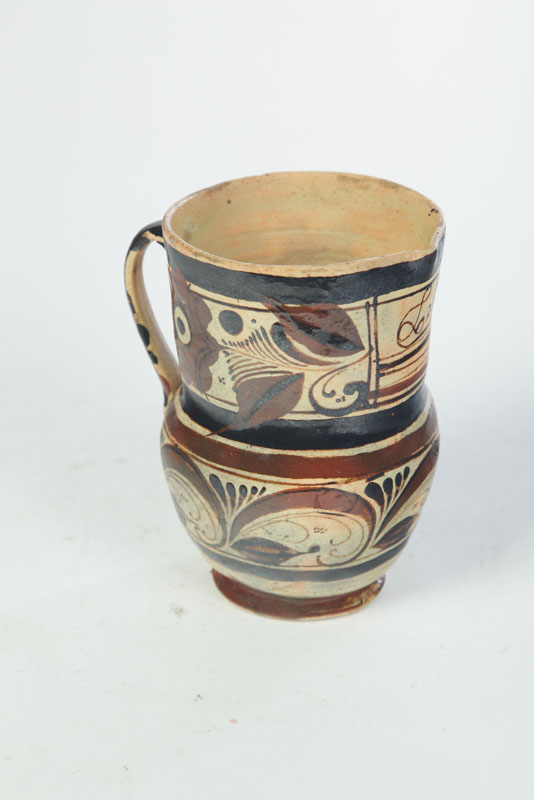 Appraisal: CREAMER Probably European th century thin pottery Slipware creamer with