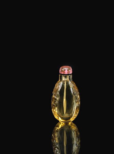 Appraisal: A yellow glass snuff bottle imitating citrine - Of elongated