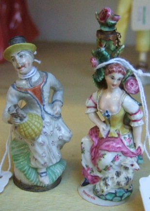 Appraisal: Two miniature figural porcelain scent bottles th century the first