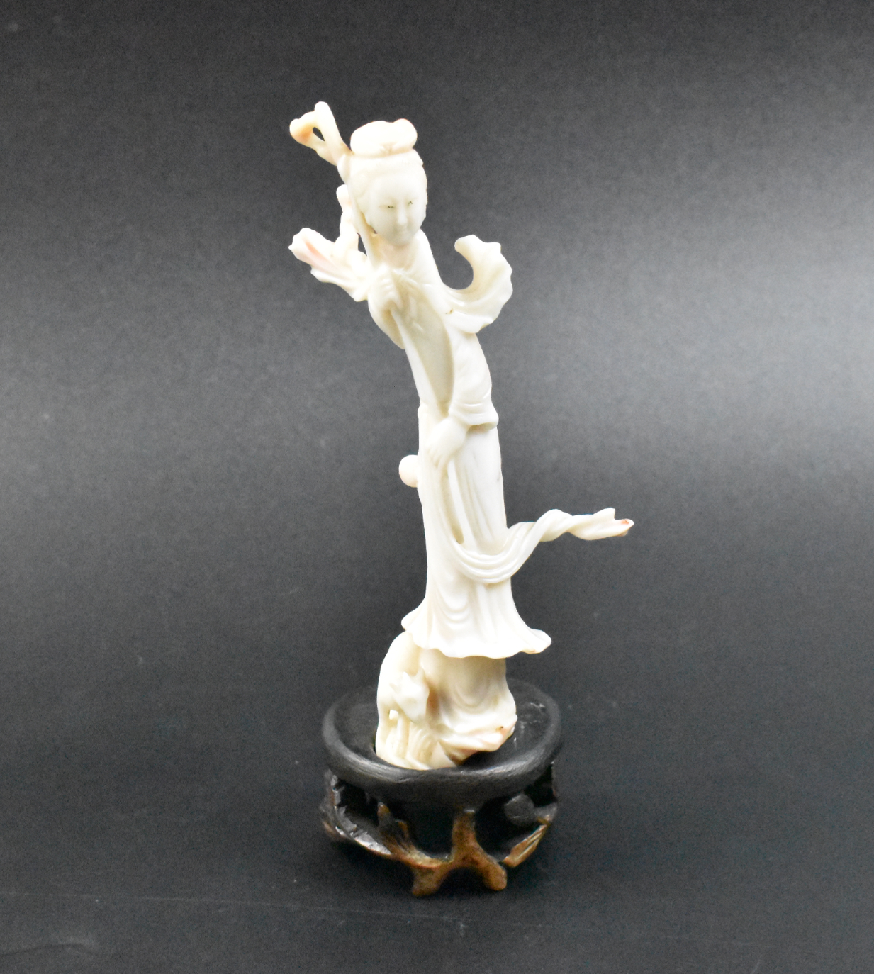 Appraisal: Chinese white coral carved lady figure on a wooden stand