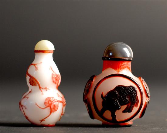 Appraisal: Two Cameo Cut Snuff Bottles a small double gourd with