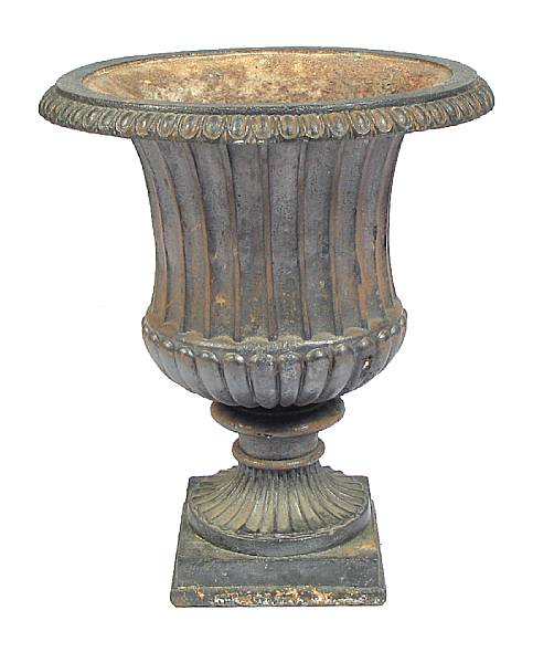 Appraisal: A cast iron garden urn of campana form height in