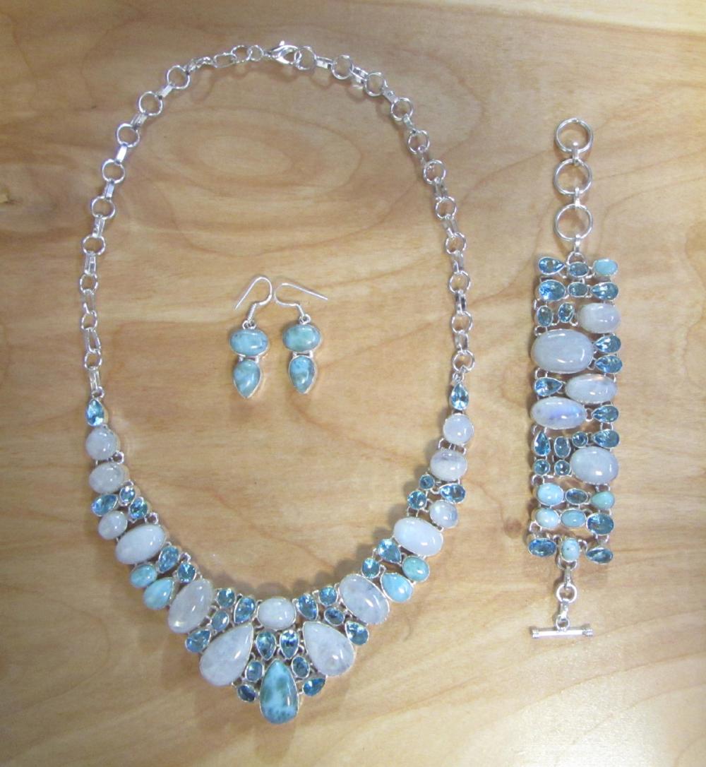 Appraisal: BLUE TOPAZ RAINBOW MOONSTONE AND LARIMAR JEWELRY SET pieces including