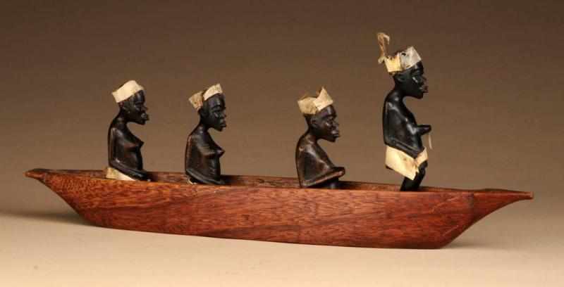 Appraisal: Central African Boat with Figures People Description From Congo Made