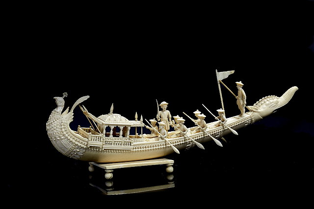 Appraisal: An Indian carved ivory Mughal type boat th Centurywith peacock