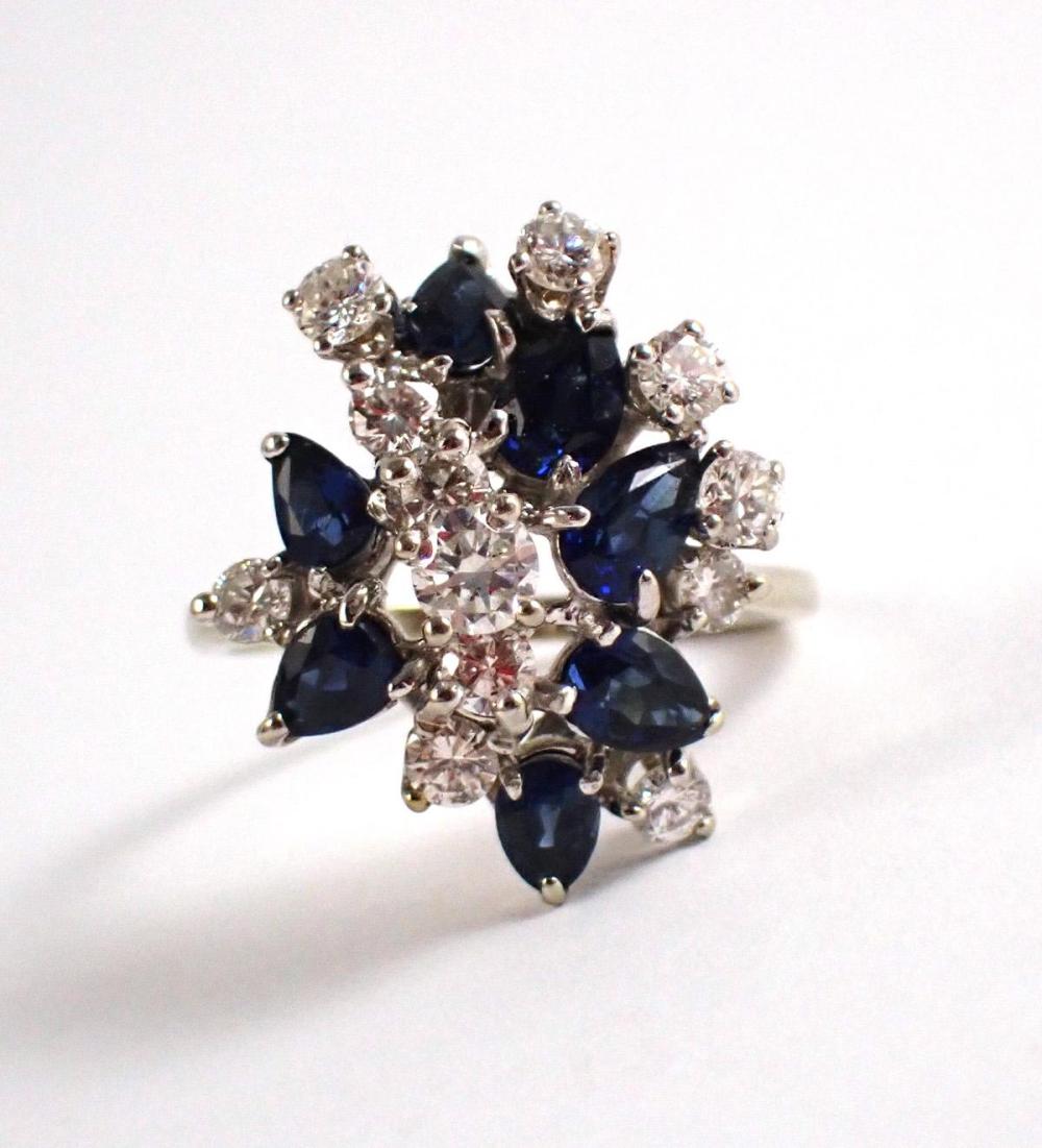 Appraisal: DIAMOND SAPPHIRE AND FOURTEEN KARAT GOLD RING The k white