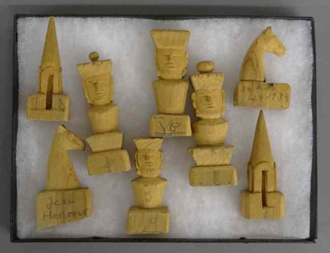 Appraisal: Set of folk art carved wooden chess pieces Signed and