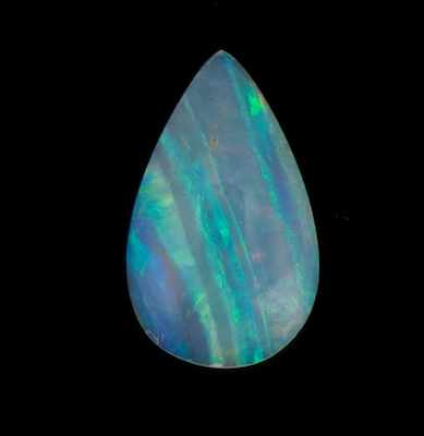 Appraisal: An Unmounted White Opal Weighing ct Pear shape cabochon displaying