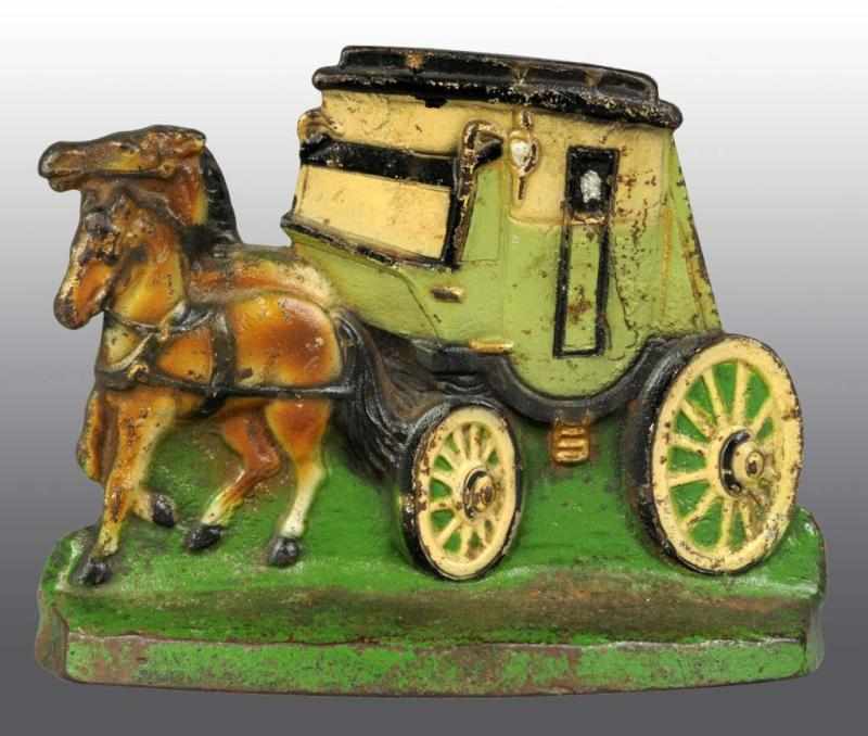 Appraisal: Cast Iron Horses with Stagecoach Doorstop Description Pat Applied For