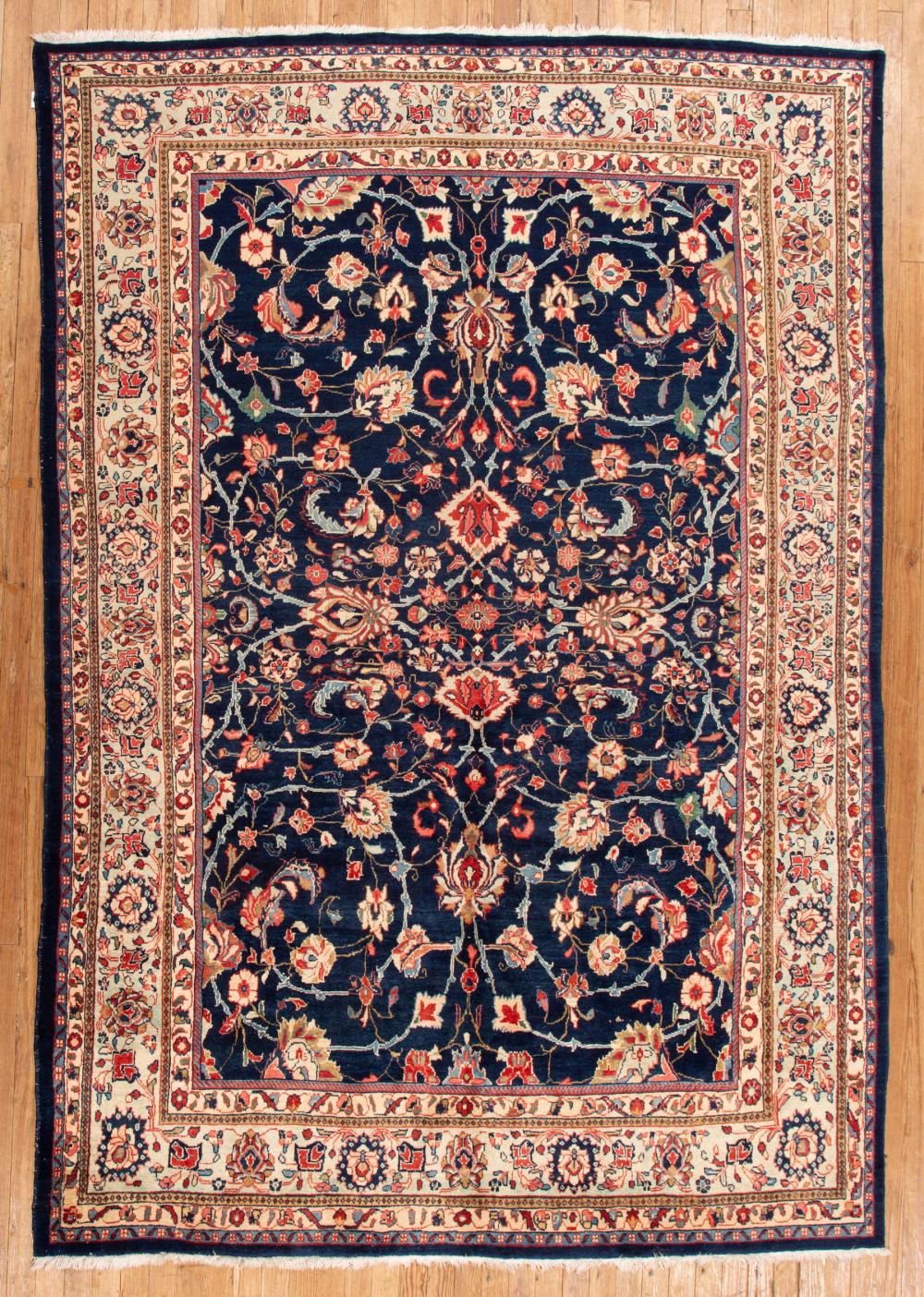 Appraisal: Persian Sarouk Carpet blue ground overall foliate design ft in