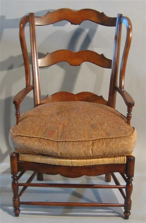 Appraisal: FRENCH PROVENCIAL STYLE FRUITWOOD WING CHAIR Twentieth century - h