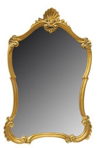 Appraisal: Louis XV style giltwood wall mirror th c featuring shaped