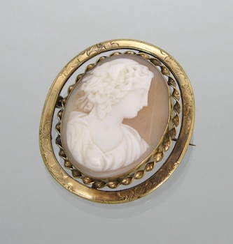 Appraisal: A Victorian Style Cameo Brooch A carved shell cameo depicting