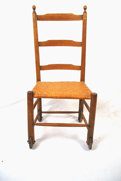 Appraisal: A Shaker-style Ladder-back Chair on Wheels the wheels of turned