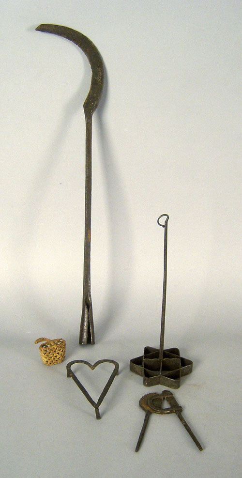 Appraisal: Wrought iron trivet cutter brand and whaling tool together with