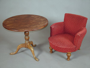 Appraisal: A tub armchair th century the rounded back and arms