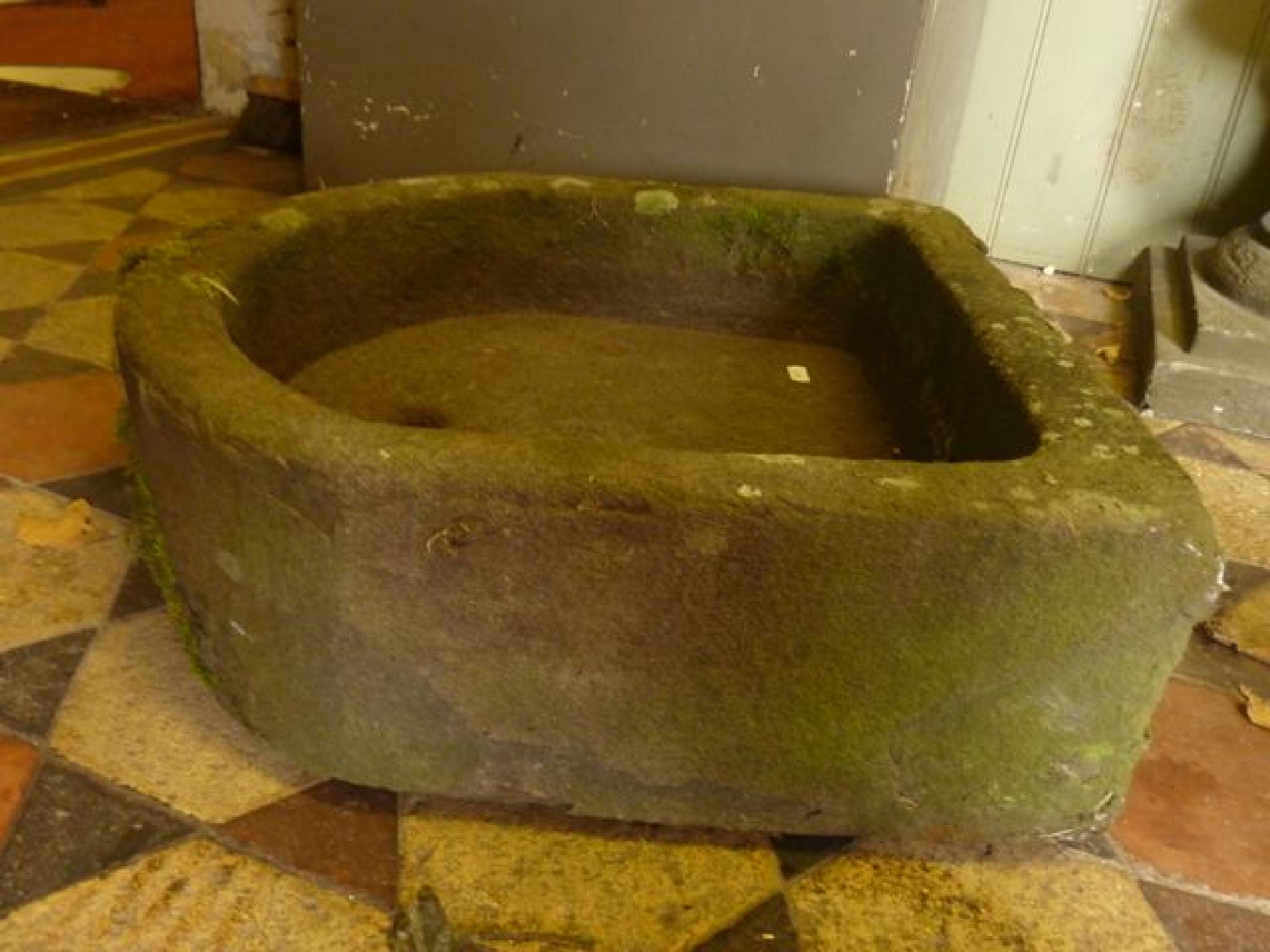 Appraisal: A weathered natural stone D end trough x cm approximately