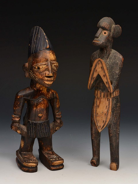 Appraisal: A YORUBA CARVED WOODEN MALE IBEJI FIGURE cm high and