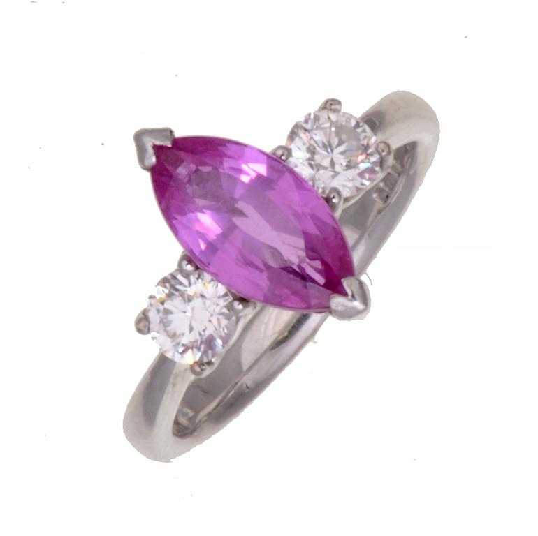 Appraisal: A PINK SAPPHIRE AND DIAMOND RING the marquise shaped pink