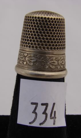 Appraisal: Simons thimble with vine band design