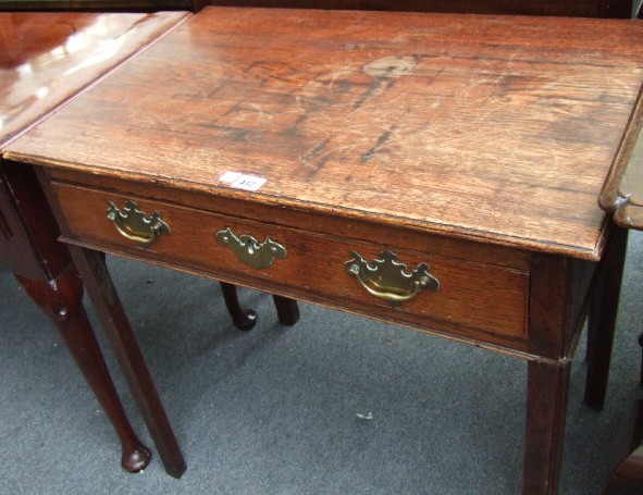 Appraisal: A George II oak side table with a single drawer