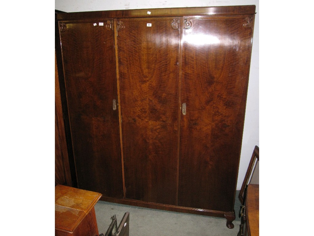 Appraisal: s Mahogany triple wardrobe