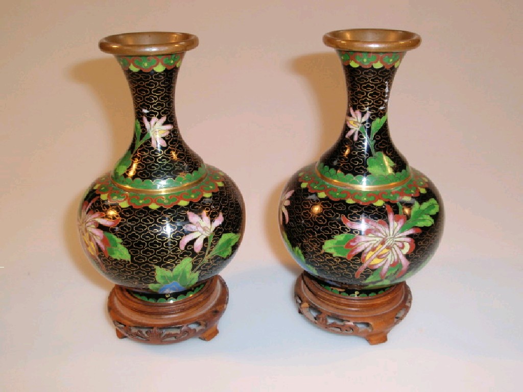 Appraisal: A pair of thC Chinese cloisonn baluster vases enamelled with