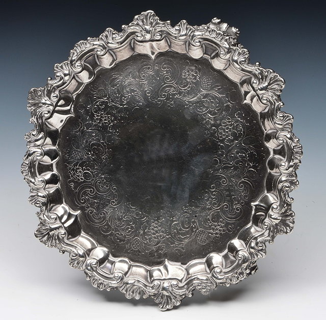 Appraisal: Georgian silver salverwith raised pie-crust border with relief scroll decoration