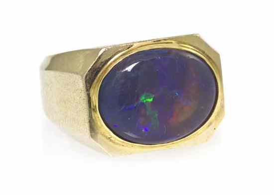 Appraisal: A Karat Yellow Gold and Black Opal Ring containing one