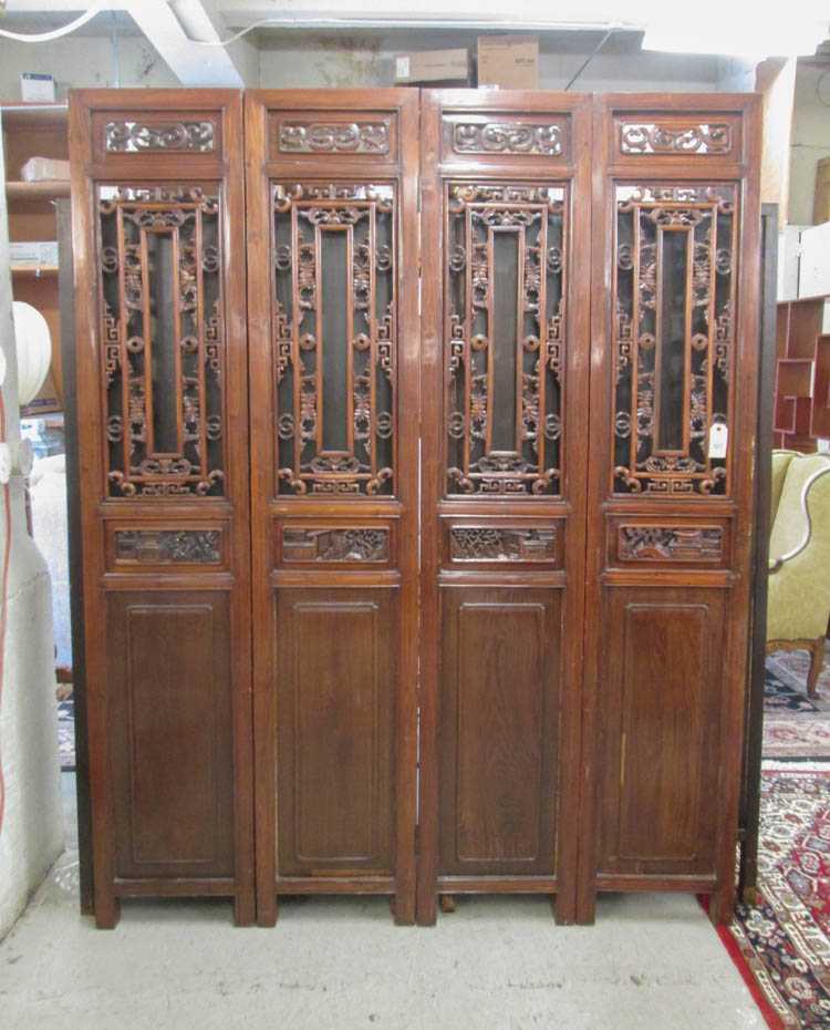 Appraisal: CHINESE FOUR-PANEL FLOOR SCREEN of elmwood construction with open fretwork