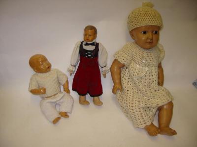 Appraisal: A French celluloid baby boy doll with painted face and