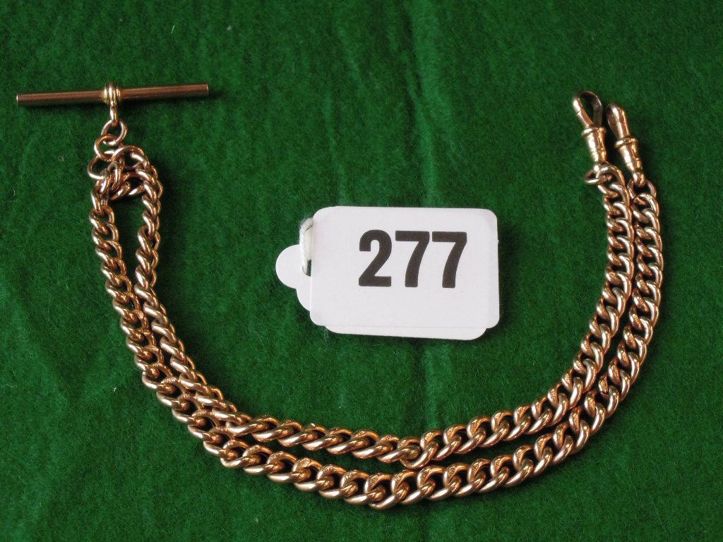 Appraisal: A ct gold watch chain with T bar and clip