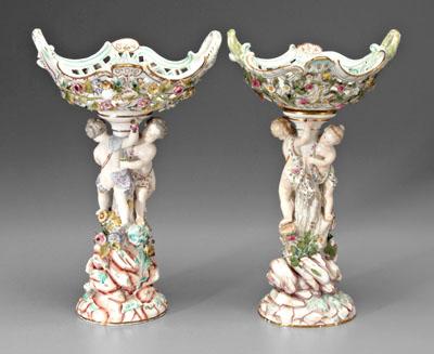 Appraisal: Two similar porcelain tazza both with pedestals with two putti