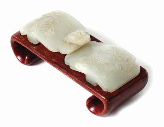 Appraisal: Chinese carved white jade wei buckle late Qing Dynasty floral