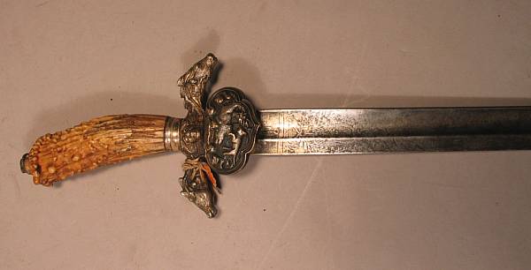 Appraisal: A continental hunting swordlate th early th century The inch