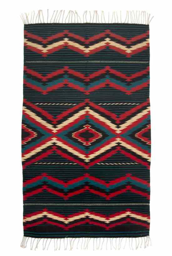 Appraisal: A Navajo Blanket having diamond decoration in black red and